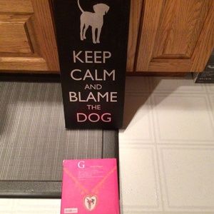 Dog wall plaque and book